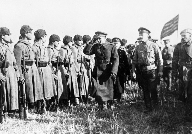 Kolchak visits the front, with his flag in the background